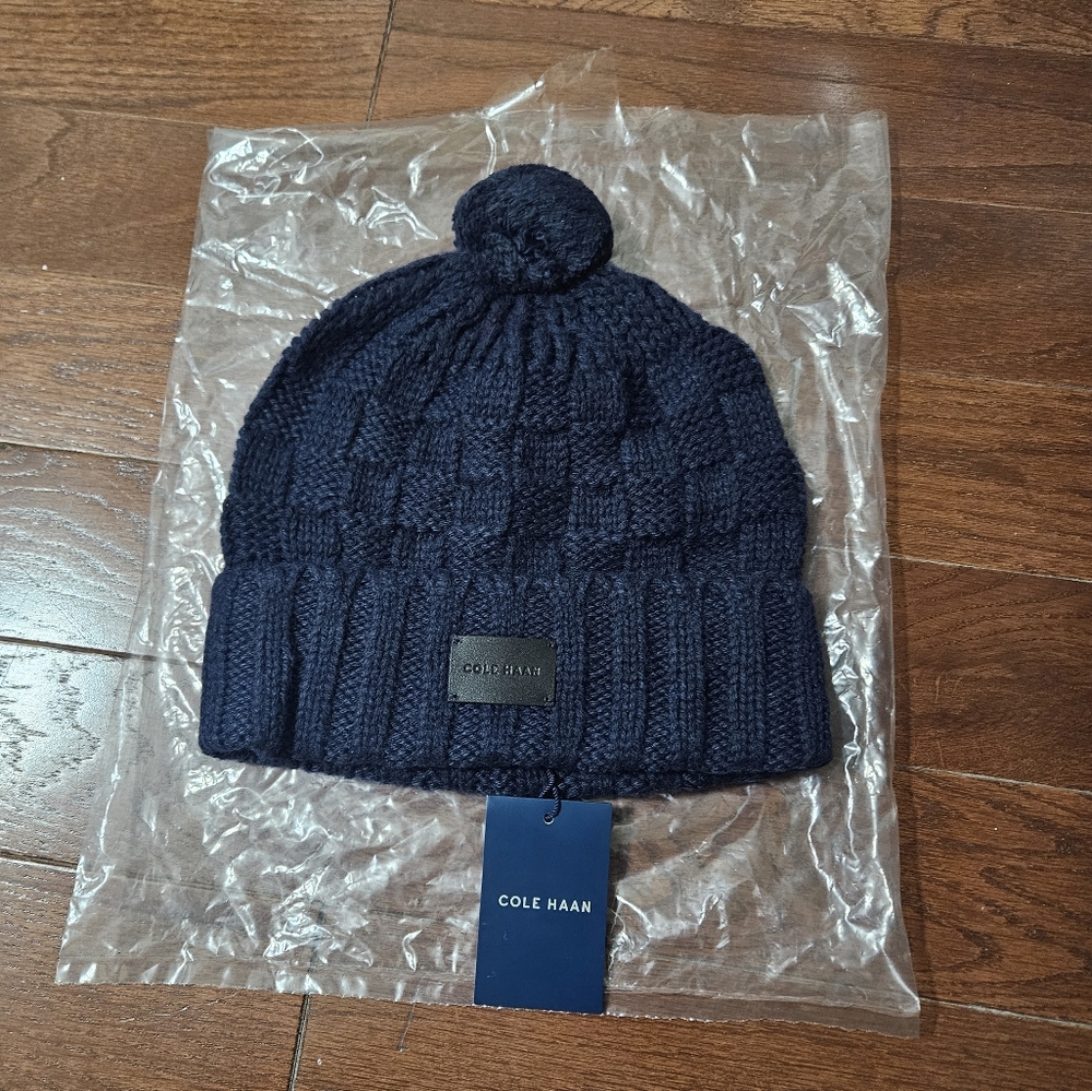Cole Haan navy blue beanie with pom pom